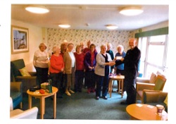 Collecting cheque from Viscount Cobham Social Fund